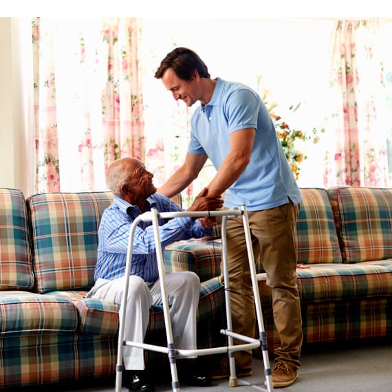 IHSS caregiver helping patient in Lancaster