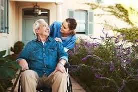 IHSS caregiver helping California patient at home